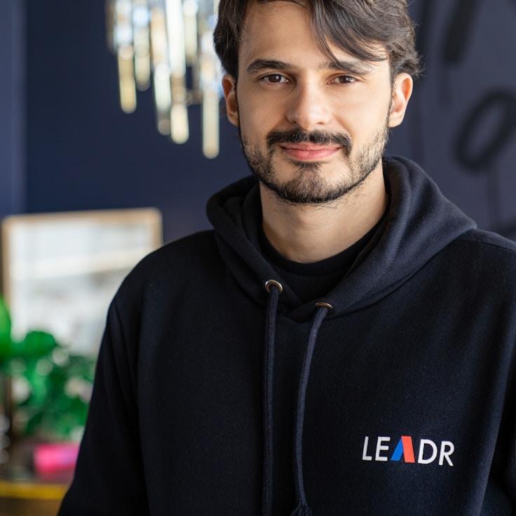 Portrait of Riley Chen, group coordinator and fusion cooking expert